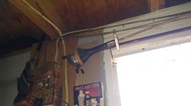 Vintage fishing poles.... rod and reels