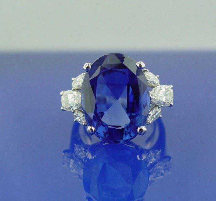 Diamond and Sapphire Ring by Oscar Heyman Featuring a 17.03ct Oval Shaped Sapphire.  
Number 67110. With AGL Certificate # CS 50189 stating Ceylon (Sri Lanka), no heat. Mtg-approx 1.50ctw -  Original cost was $350,000