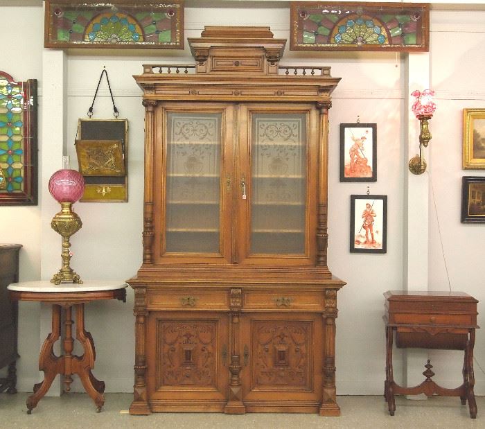 Victorian bookcase, stained glass windows, m/t table, sewing stand