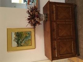 Kindel fruitwood buffet with four piece mached venner Top 56 x 19. Height 33. Center drawer divided with tarnish resistant cloth. Behind the two right hand doors there is a large drawer for linen and a removable shelf.