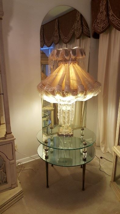 Glass table and large crystal lamp