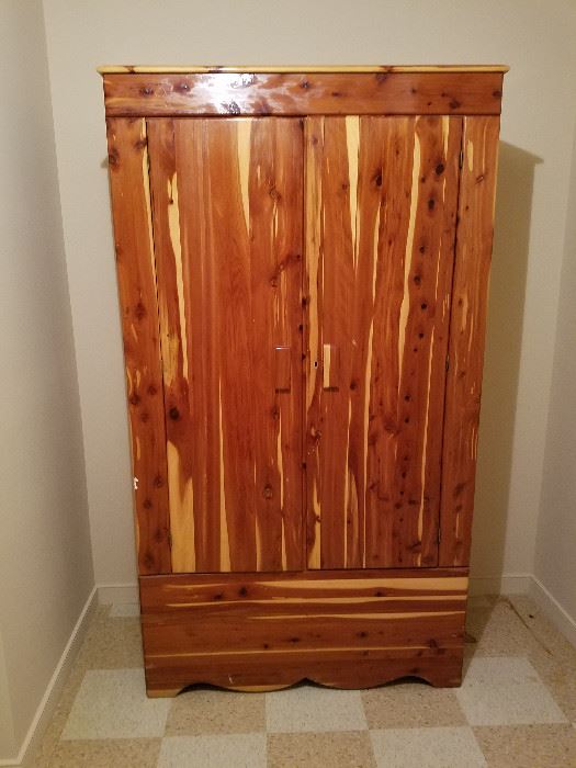 Solid Cedar wardrobe with hidden bench  http://www.ctonlineauctions.com/detail.asp?id=668339