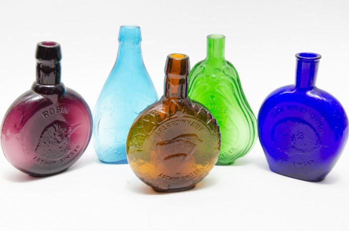  Various Colored Arthur Singer Glass Bottles  http://www.ctonlineauctions.com/detail.asp?id=668251