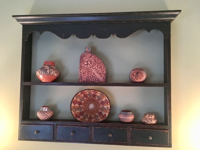 Wall shelf with Acoma pottery