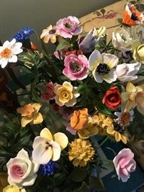 A couple dozen porcelain flowers