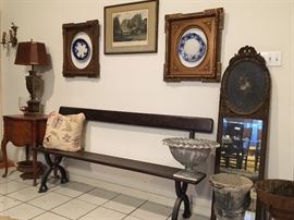 Antique English Tram Bench with cast iron Gothic revival legs.