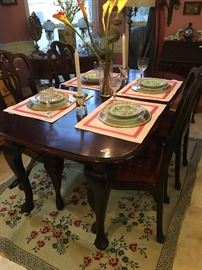 Victorian era 'Queen Anne' style dining table with a hand crank mechanism 