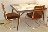 Kitchen table and 3 chairs. Mid century.