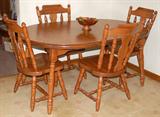 Large all wood table and chairs and 2 leafs