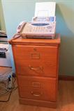 Fax machine and wood file cabinet