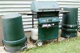 Gas grill and garbage cans