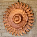 Outdoor hanging copper suns (3)