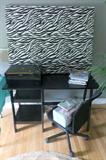 Black desk, printers, desk chair