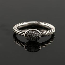 David Yurman Sterling Silver Diamond Ring: A David Yurman sterling silver diamond ring. Thjis ring features pavé diamonds in a bezel with twisted band by David Yurman