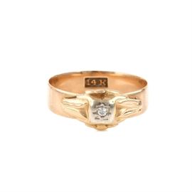 14K Yellow Gold Diamond Ring: A 14K yellow gold diamond ring.