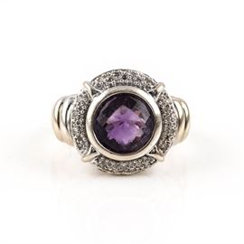 14K White Gold Amethyst and Diamond Ring: A 14K white gold amethyst and diamond ring. This ring features a round checkerboard amethyst with a diamond halo and an openwork gallery.