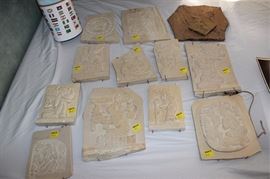 Box lot of reproduction Mayan wall hanging  plaques, world map, and flag
