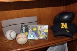 Box lot of sports memorabilia, cap, cards, balls,  etc.
