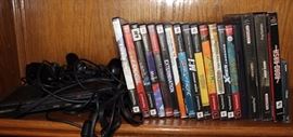 Playstation 2 with games and two controllers
