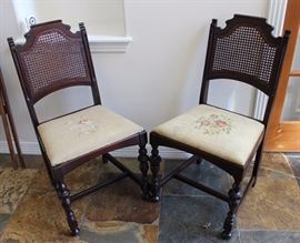 Pair of antique cane back chairs, needlepoint  seats, 37" H, 19" x 17"
