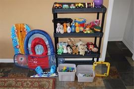 Box lot of children's toys, blocks, stuffed  animals, cars, pool floats, shelving not included
