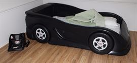 Little Tikes car bed with mattress, 27" H, 8' x 4  1/2', located on 2nd floor, bring manpower
