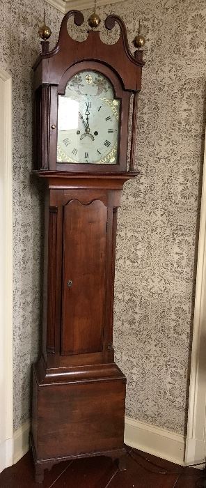 Early Cherry, Grandfather Clock with Hand Painted Face and Brass Finials. 