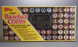 Offered is a new in box 1990 Topps Baseball Coin set. The original cellophane wrap is torn in several places and is cloudy. Please see the photos for more details.