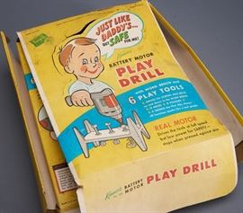 Offered is a vintage Kenner Battery Operated Play Drill from 1957. The drill is new in the box. There are several pieces missing: the axe with flint and the buffer. The box is torn in several places. This is labeled a Prestige Toy. This item has not been tested and is sold as-is. Please see the photos for more details.