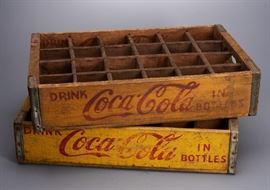 Offered is a lot of 2 vintage Coca-Cola crates. Both are painted yellow with red letters. There is some fading and chipping to the paint. The crates hold 24 glass bottles each. Please see the photos for more details.