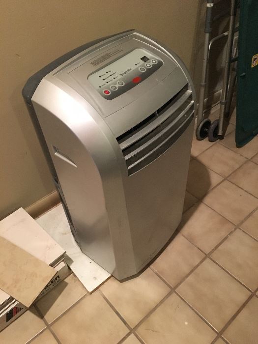 Portable air conditioner - drains to outside