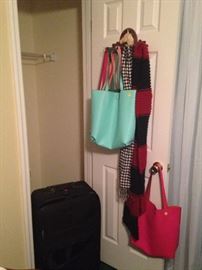 Packed for a weekend getaway!! Luggage, large tote bags, and scarves to finish the ensemble. 
