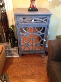 Can you say versatile?? Night stand, end table, hallway decor, lipstick checker. Classy mirrored storage with one pull out drawer and 3 shelves inside. Excellent condition and I've got 2, yes, 2!
