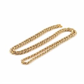 18K Yellow and White Gold Twisted Chain: An 18K yellow and white gold twisted chain. This necklace is a two-tone chain that resembles a twisted rope, but featuring a yellow gold rope twisted with a white gold box.