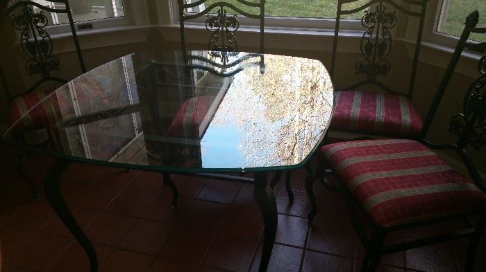 Glass top kitchen table and chairs.