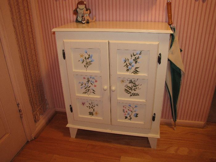 A white painted cabinet.