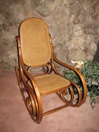 A rattan rocking chair, just perfect for relaxing.
