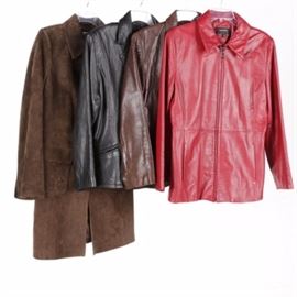 Women's Leather Jackets and a Coat Including Jones New York: An assortment of three women’s leather jackets and a leather coat. This selection includes a brown leather coat by ATL Studios with a turn-down collar, button closures, flap pockets and an acetate lining; and a brown leather jacket by Free Country USA with a turn-down collar, full zip closure, slash pockets and a nylon blend lining. The grouping also includes a black leather jacket by Jones New York with notched lapels, a three button closure, welt pockets and a polyester lining; and a red leather jacket by Colebrook with a turn-down collar, full zip closure, slash pockets and a nylon blend lining.