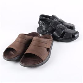 Men's Alfani and Bass Leather Sandals: A pairing of men’s sandals. Included are leather Palm Black style woven sling back sandals by Afani with rubberized soles in size 10. Also included a pair of brown Alton Bay slide on sandals in brown leather with a molded foot beds and rubberized soles in size 9.5.