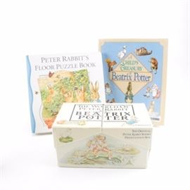 1989 "The World of Peter Rabbit" Box Set and Other Beatrix Potter Books: A collection of Beatrix Potter books. This collection features the twenty-three-volume “presentation box” set The World of Peter Rabbit (Frederick Warne & Co., 1989); these hardcover volumes feature a newly reproduced 1987 edition of the color illustrations, electronically scanned from Potter’s original watercolors. Also included are A Child’s Treasury of Beatrix Potter (Portland House, 1997) and Peter Rabbit’s Floor Puzzle Book (Frederick Warne & Co., 2001).