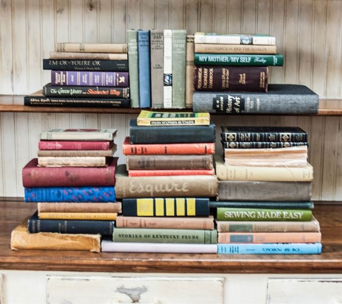 Collection of Vintage Books: An assortment of vintage books. This grouping includes “Old Curiosity Shop,” by Charles Dickens, “Peter Pan,” by J.M. Barrie, “Billy Wood Chuck,” by Arthur Scott Bailey and more.