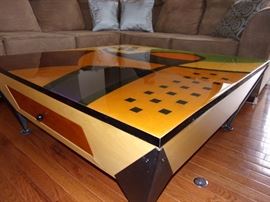 Microsuede sectional excellent condition. Custom made art piece coffee table. Unique conversational piece!