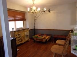 Vintage style arc floor lamp, custom made art piece coffee table. Unique conversational piece! Wine refrigerator, Buffet& wine rack combo.