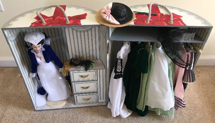 Scarlet O'Hara doll in wardrobe with outfits