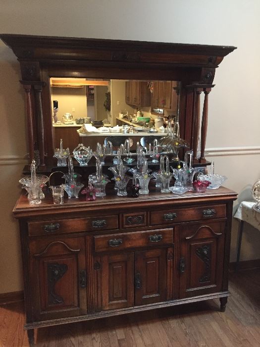 Wonderful Scottish sideboard with a rare collection of antique glass baskets.