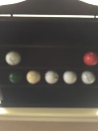 Golf rack with golf balls