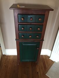 Tall cabinet. Measures about: 48" high, 22" wide, 13" deep