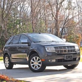 2007 Lincoln MKX: A 2007 Lincoln MKX, VIN: 2LMDU68C57BJ03074, odometer reads: 267,608. This front wheel drive, four door crossover is powered by a fuel injected 3.5L V6 mated to a six speed automatic transmission with selectable over drive. The vehicle rides on 18" alloy wheels with 245/60R18 tires. Interior features include leather upholstered seats with power adjustable front bucket seats, opening and tilting sun shades, steering wheel mounted stereo controls, AM/FM/CD player stereo with large display screen, split folding rear seats and a lifting rear hatch with storage area.