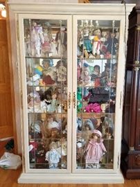 Lighted curio cabinet. Hundreds of dolls!