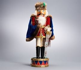 Offered is a vintage musical nutcracker from Christopher Radko , #1666 of 2500. The musical effect is in working condition and plays "Lara's Song". The original tags are attached. There is some minor scratches in the paint and a small chip on the end of the nose. This item is sold as-is. Please see the photos for more details.